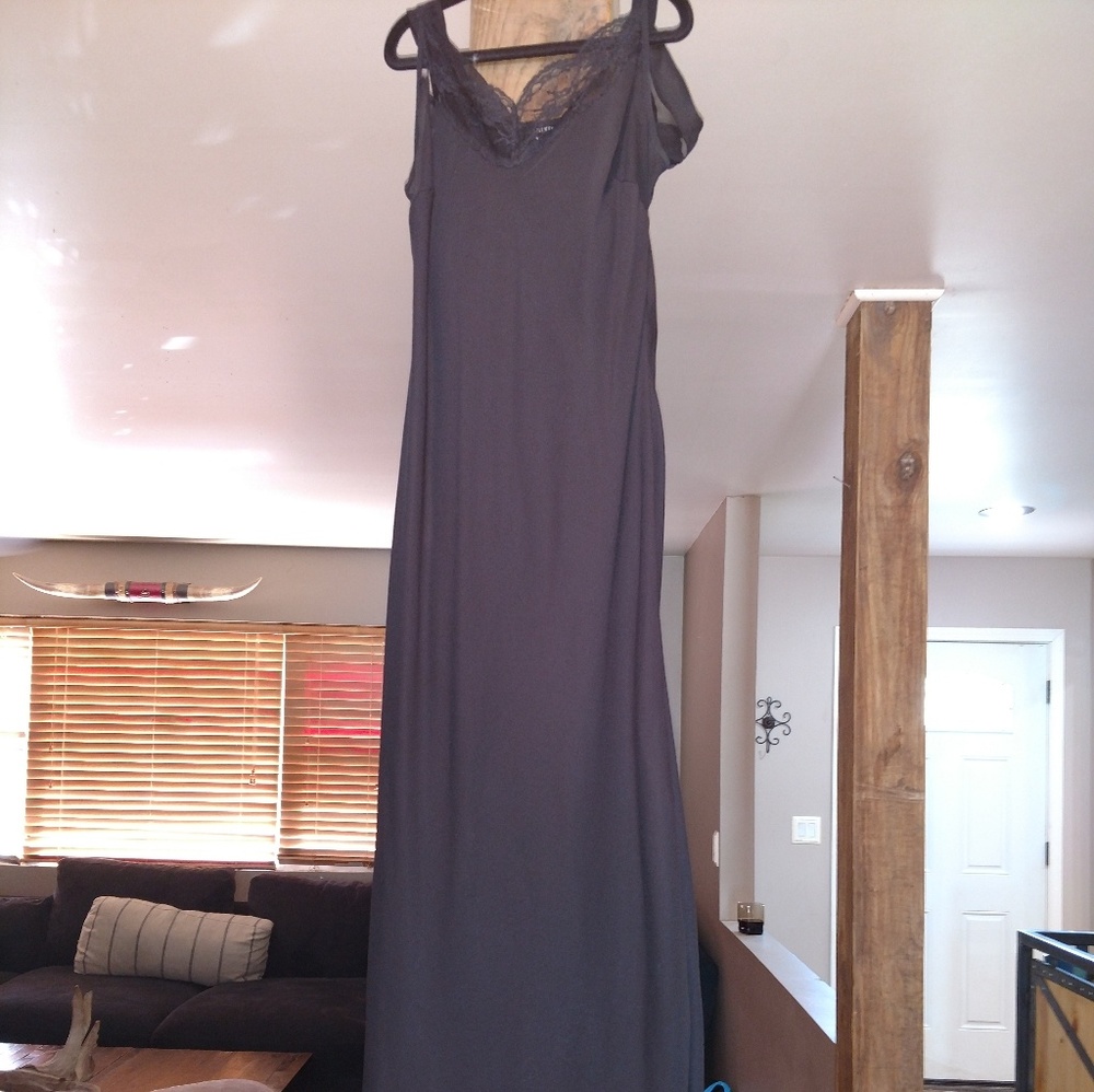 Evening gown in black sheer with underlay